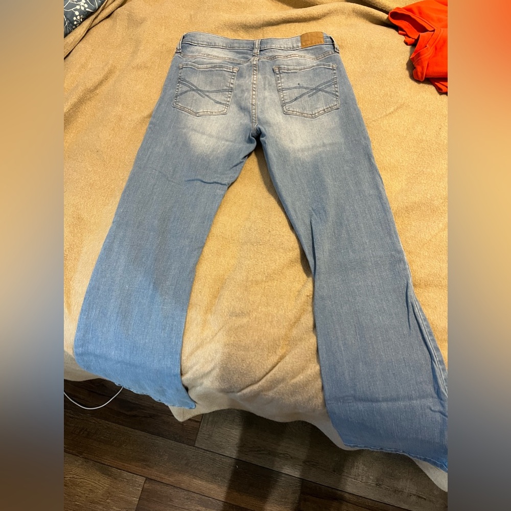 Aeropostale boot cut low rise distressed jeans. Size 10 , light wash blue.